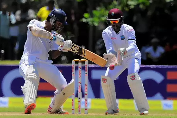 Dimuth Karunaratne batted in a steady manner to help Sri Lanka forward. Dimuth Karunaratne batted in a steady manner to help Sri Lanka forward.