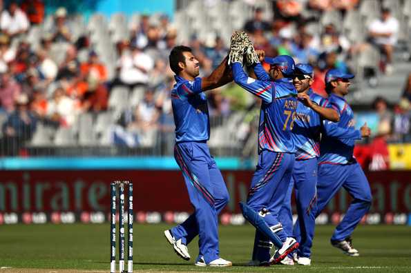Dawlat Zadran struck in his very first over to remove Calum Macleod for nought