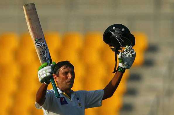 Pakistani batsman Younis Khan celebrates after scoring a century (100 runs) during the first day of the second test cricket match between Pakistan and Australia at Zayed International Cricket Stadium in Abu Dhabi on October 30, 2014 Pakistani batsman Younis Khan celebrates after scoring a century (100 runs) during the first day of the second test cricket match between Pakistan and Australia at Zayed International Cricket Stadium in Abu Dhabi on October 30, 2014