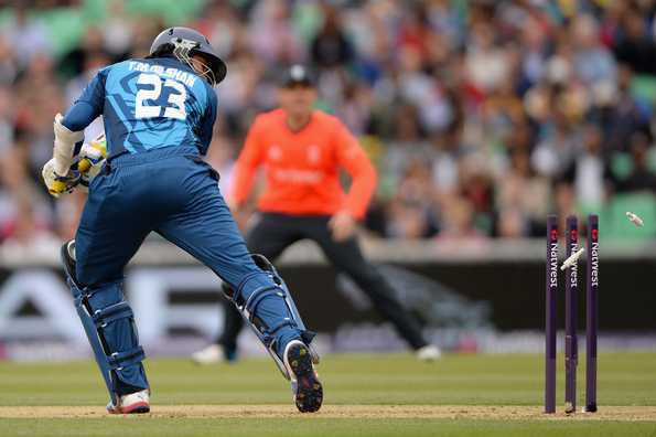 Tillakaratne Dilshan is bowled by Harry Gurney.