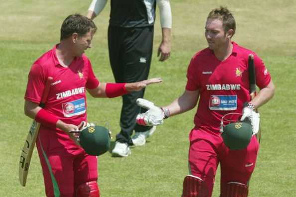 Zimbabwe's captain Brendon Taylor (right) celebrates with teammate Raymond Price after making an unbeaten 107 runs on the second one-day international against New Zealand in Harare. Taylor hit his second successive unbeaten century to lead his team to a competitive 259 for eight. Zimbabwe's captain Brendon Taylor (right) celebrates with teammate Raymond Price after making an unbeaten 107 runs on the second one-day international against New Zealand in Harare. Taylor hit his second successive unbeaten century to lead his team to a competitive 259 for eight.