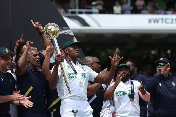 Kagiso Rabada holds the WTC mace aloft Kagiso Rabada holds the WTC mace aloft