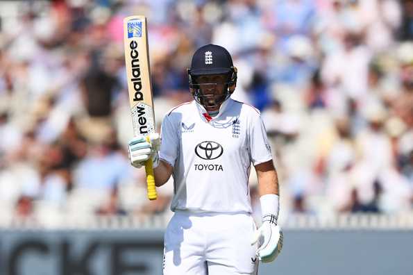 Joe Root acknowledges the crowd after reaching 50 Joe Root acknowledges the crowd after reaching 50
