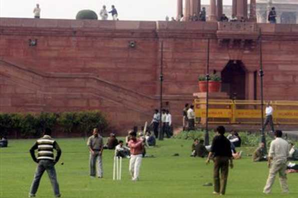 Indian government office workers play cricket during lunch break in front the Government Secretariat building in New Delhi on December 11. The Indian cricket team should not tour Pakistan following last month's terror attacks in Mumbai, the country's sports minister said here on Friday. Indian government office workers play cricket during lunch break in front the Government Secretariat building in New Delhi on December 11. The Indian cricket team should not tour Pakistan following last month's terror attacks in Mumbai, the country's sports minister said here on Friday.