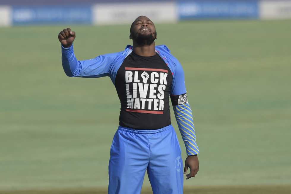 Phehlukwayo cocked his right fist in the air and whipped the front of his playing shirt over his head to reveal a printed T-shirt underneath Phehlukwayo cocked his right fist in the air and whipped the front of his playing shirt over his head to reveal a printed T-shirt underneath